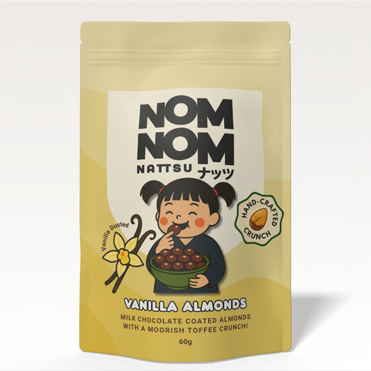 Yellow packaging of NOM NOM Natus Vanilla Almonds with a cartoon character on a white background